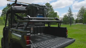 Ranger XP 1000 dumping firewood from the 1,000 pound cargo box.