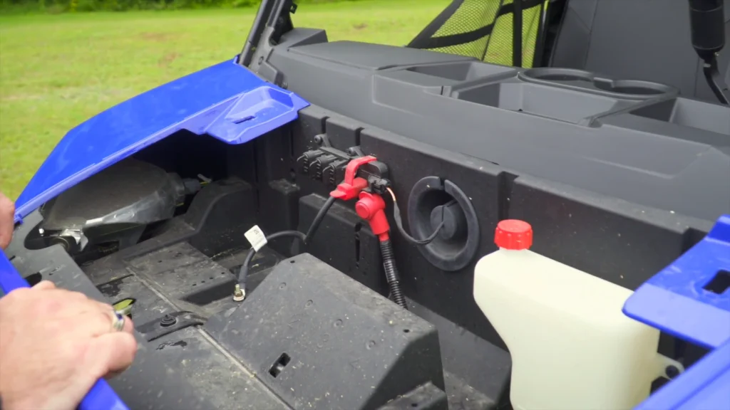 Ranger XP 1000 cab interior with bench seat and under seat storage.