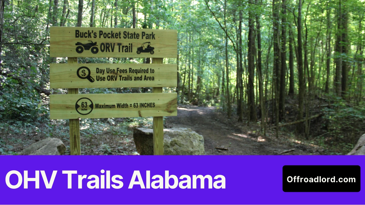 Riders at an OHV trailhead in Alabama checking a map board and rules signage before riding, showing OHV trails Alabama planning.